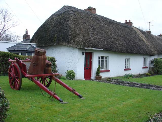 Churn in front of a house